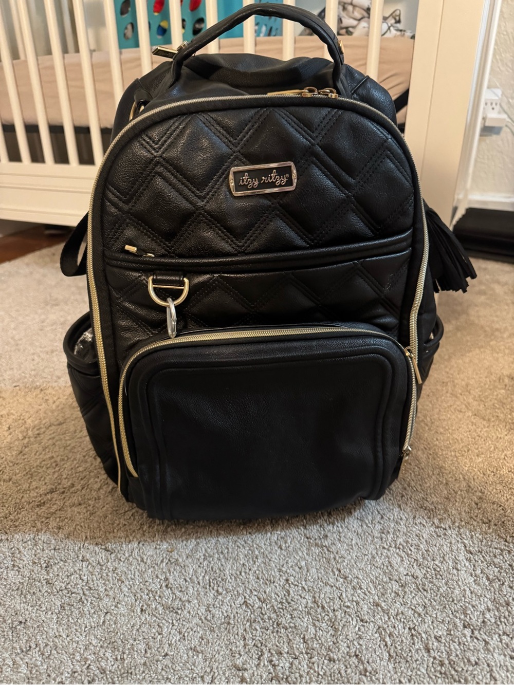 Itzy Ritzy Black Quilted Diaper Bag with Gold Accents